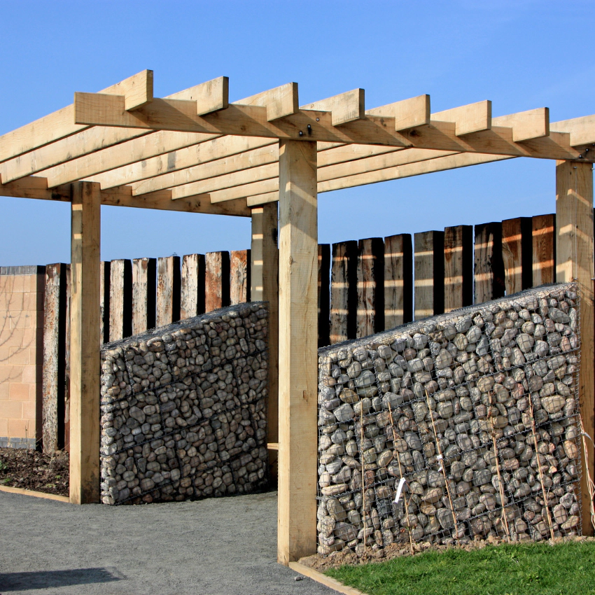 Custom Pergola with stone siding | Arthouse Renovation